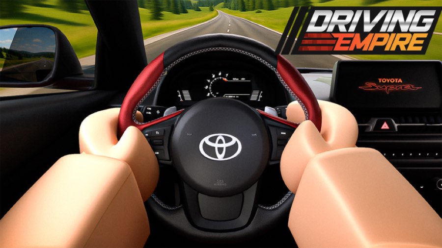 First-person view of hands on a Toyota Supra steering wheel on an open highway
