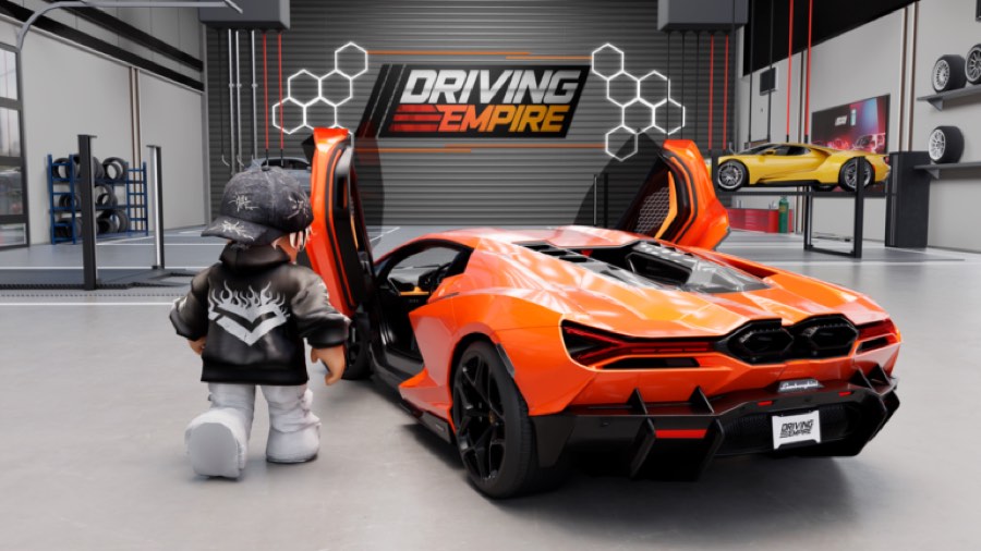 Orange supercar with doors raised inside a showroom garage